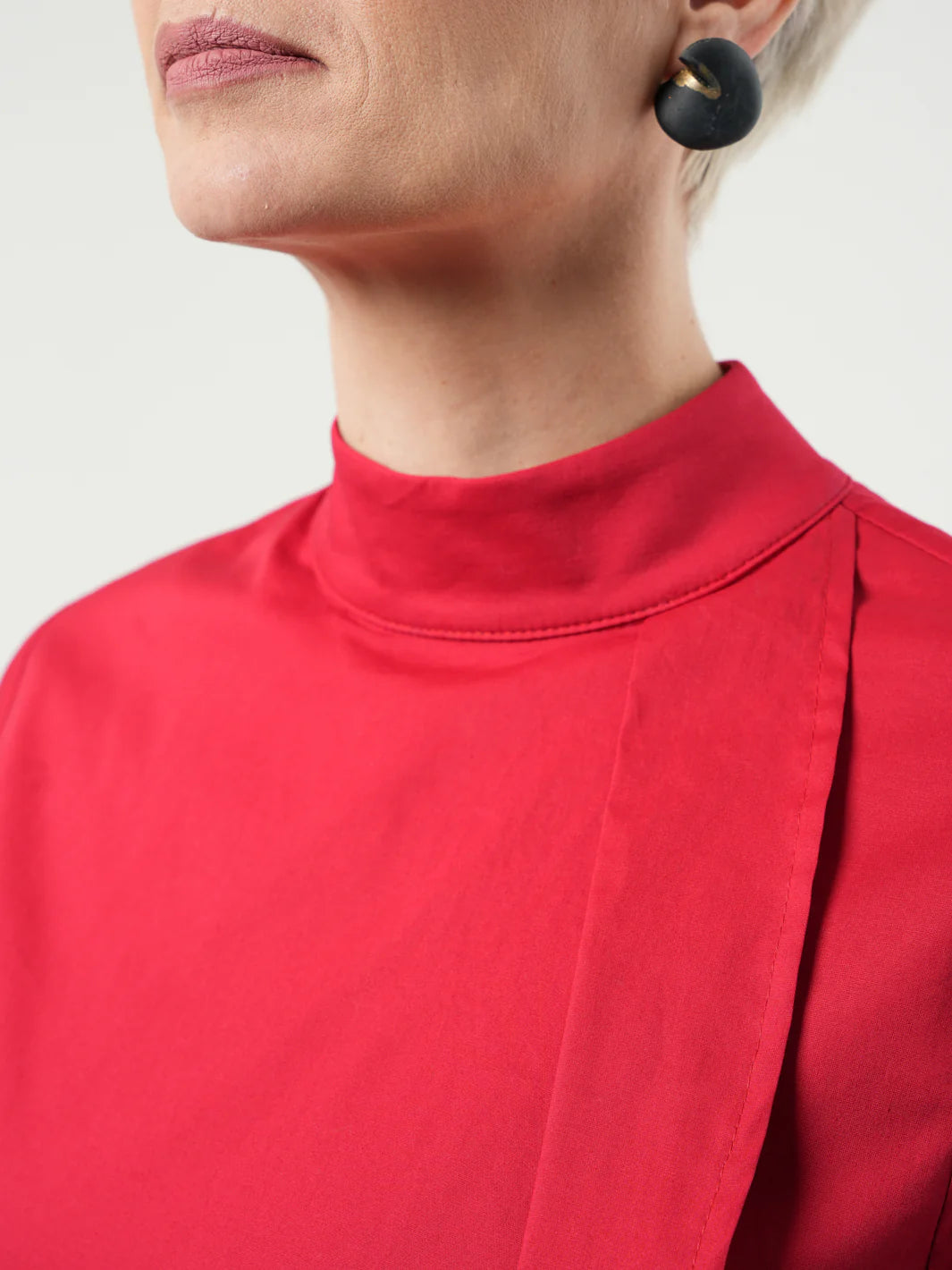 ASYMMETRIC TUNIC SHIRT IN RED by Metamorphoza