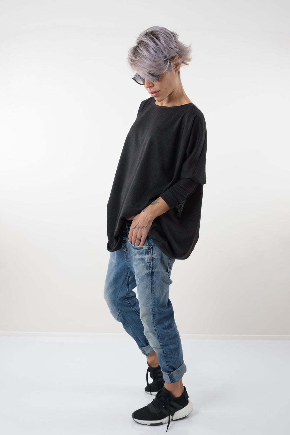 BLACK OVERSIZE ASYMMETRIC KNITTED OPEN BACK BLOUSE