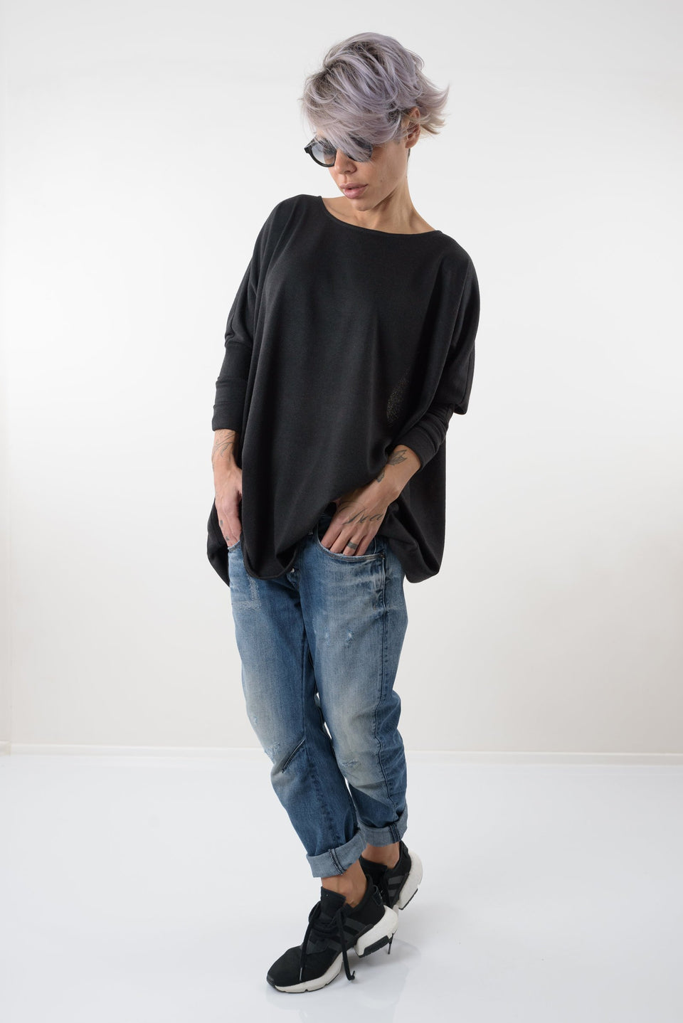 BLACK OVERSIZE ASYMMETRIC KNITTED OPEN BACK BLOUSE